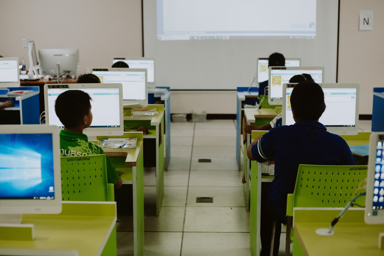 Students learning in computer class
